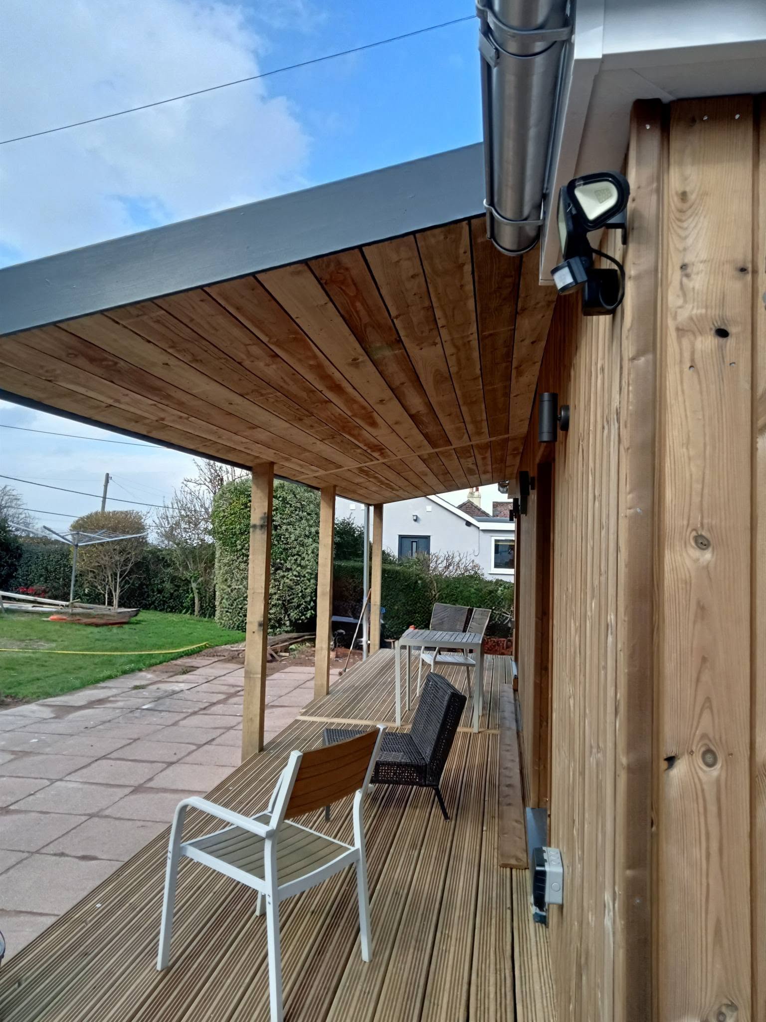 Finished timber garden room extension with veranda, built by Colin Nunn Construction