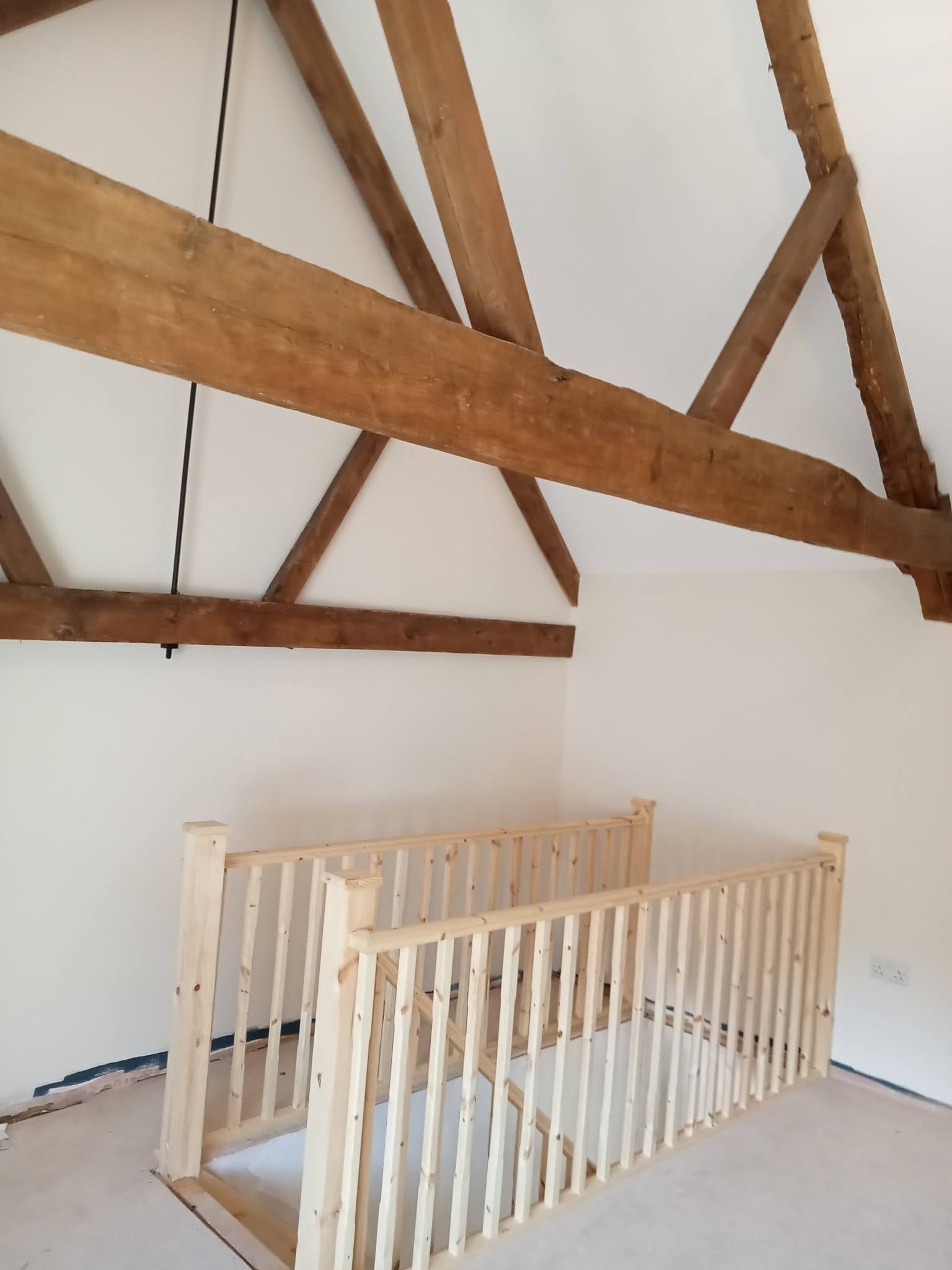 Finished loft conversion staircase and railing