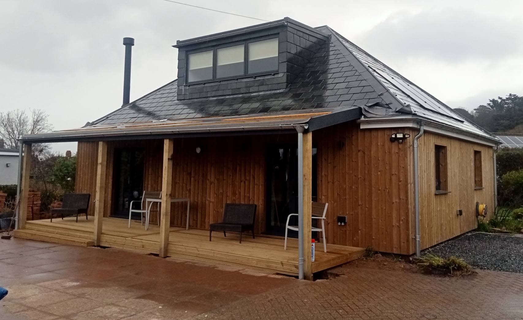 Finished glazed porch extension with white uPVC doors