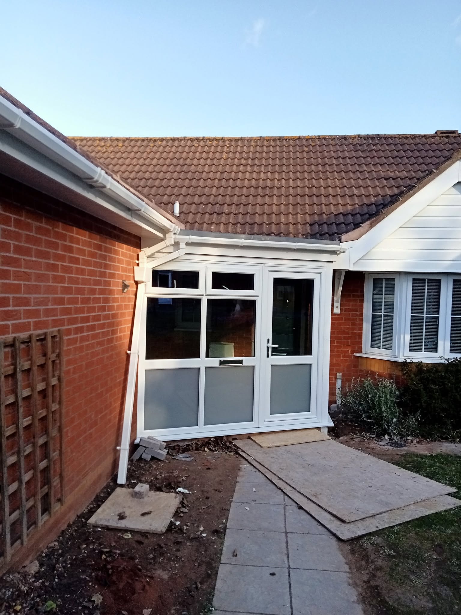 Finished garden room extension with white French doors