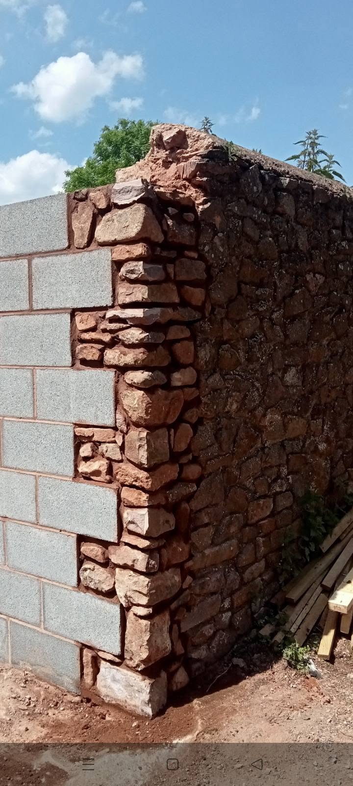 Traditional stone and blockwork wall corner detail